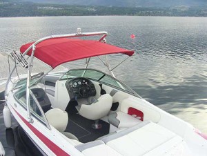 Interior view of red Malibu ski and wakeboard boat