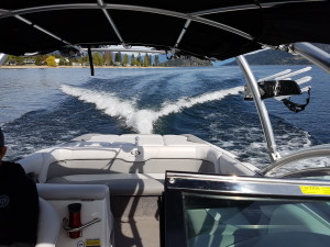 View towards the back of moving wake surfing boat